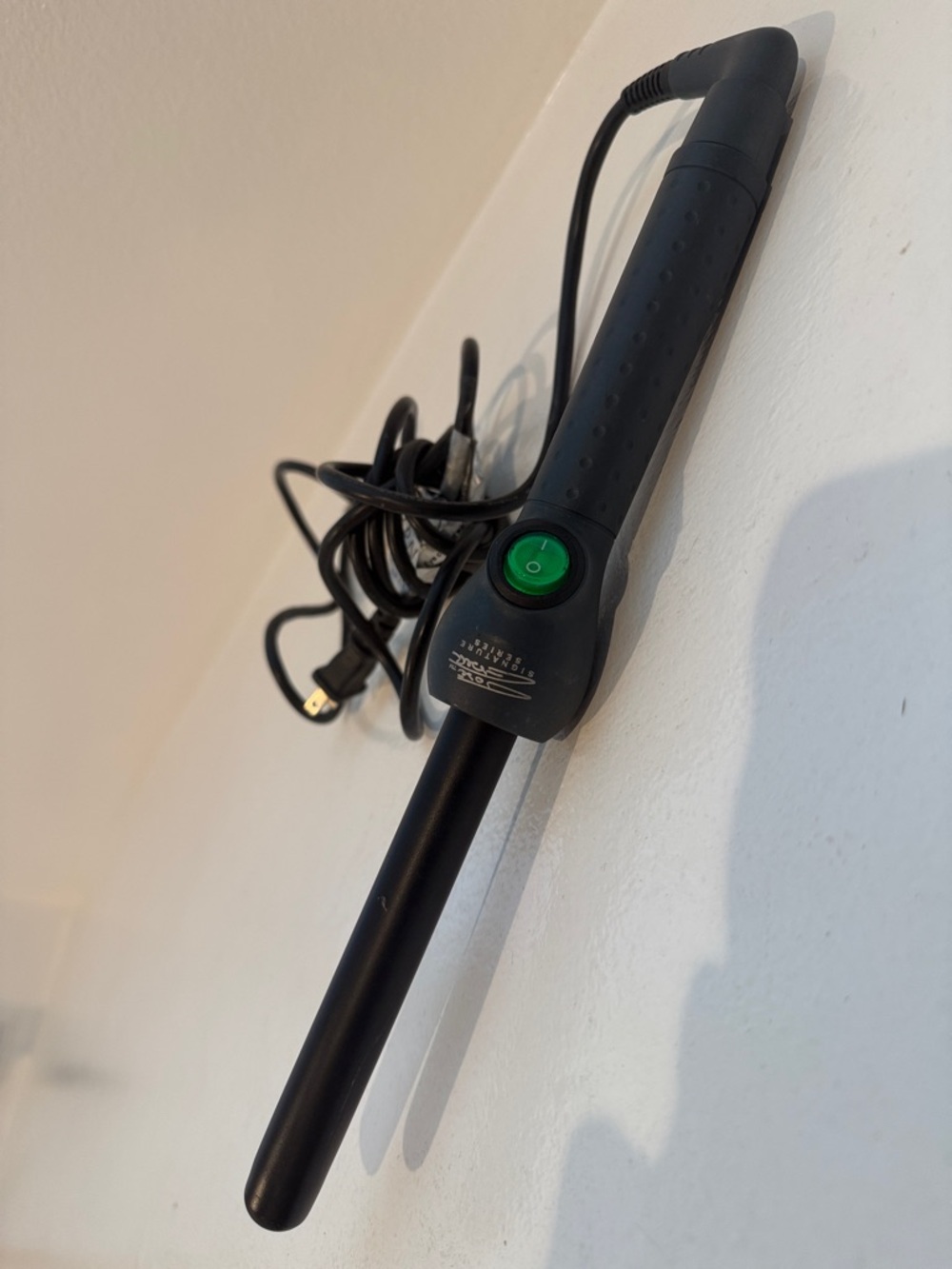 Black Curling Wand Hair Tool with Green Power Button